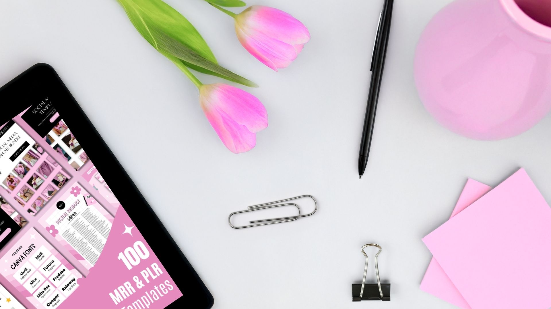 Pink tulips, black pen, pink vase, sticky notes, and black tablet showing Pinterest Pin templates.
