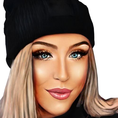 A selfie of Gabi with blonde hair, wearing a black winter cap and black sweater, smiling with makeup on, against a white background.