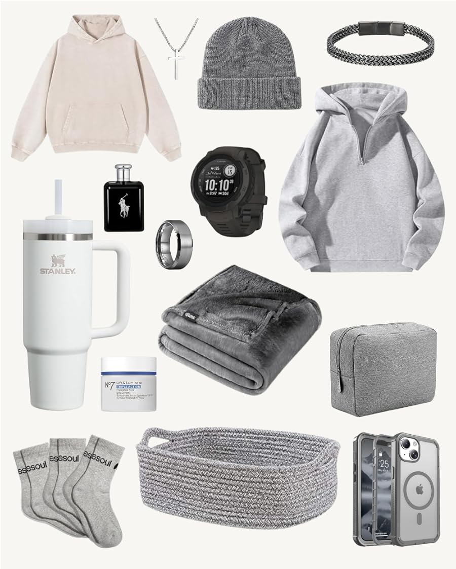 A monochromatic gift collection laid out for a "gift basket for guys," featuring a white Stanley tumbler, a tan hoodie, a grey quarter-zip hoodie, a grey knit beanie, a black digital sports watch, a silver cross necklace, a chain bracelet, a silver band ring, a dark grey plush throw blanket, a grey woven basket, a set of grey socks, a grey tech or toiletry case, a clear phone case, a container of No7 cream, and a bottle of Ralph Lauren Polo cologne.