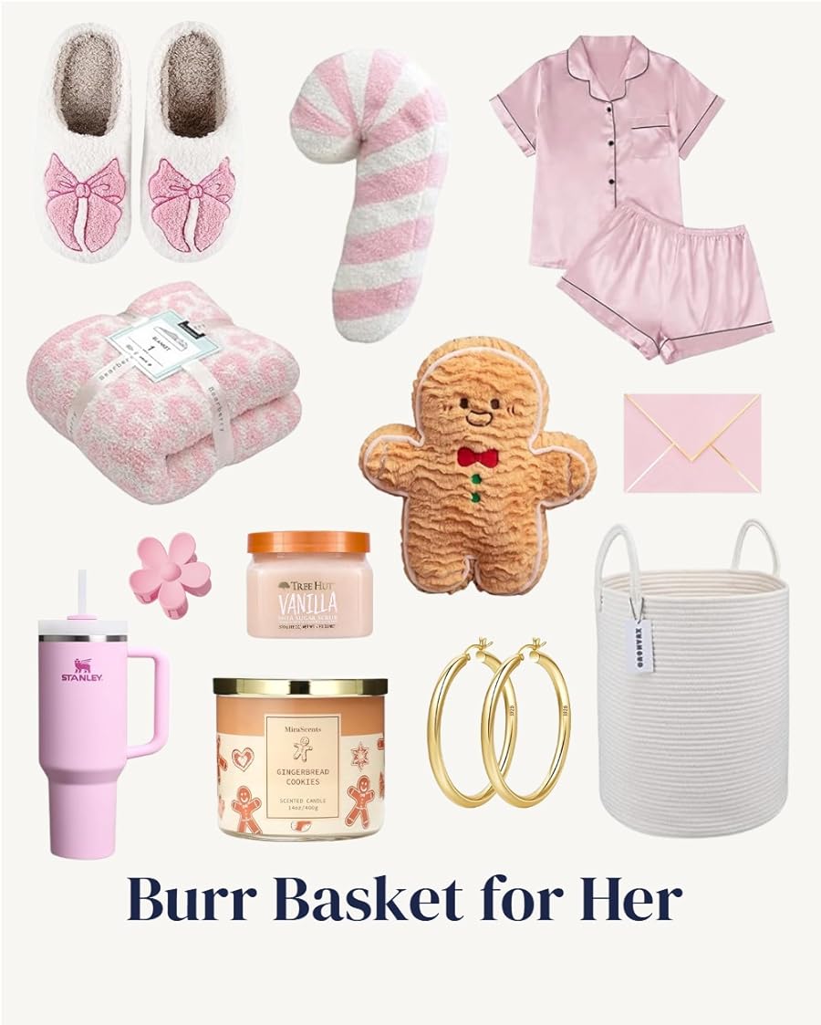 A collection of gifts for a "Burr Basket for Her" featuring a pink Stanley tumbler, pink bow slippers, pink satin pajamas, a gingerbread man plush, a pink and white candy cane pillow, a pink leopard print blanket, a gingerbread cookie scented candle, a vanilla body butter, gold hoop earrings, a pink flower hair clip, and a white rope basket.