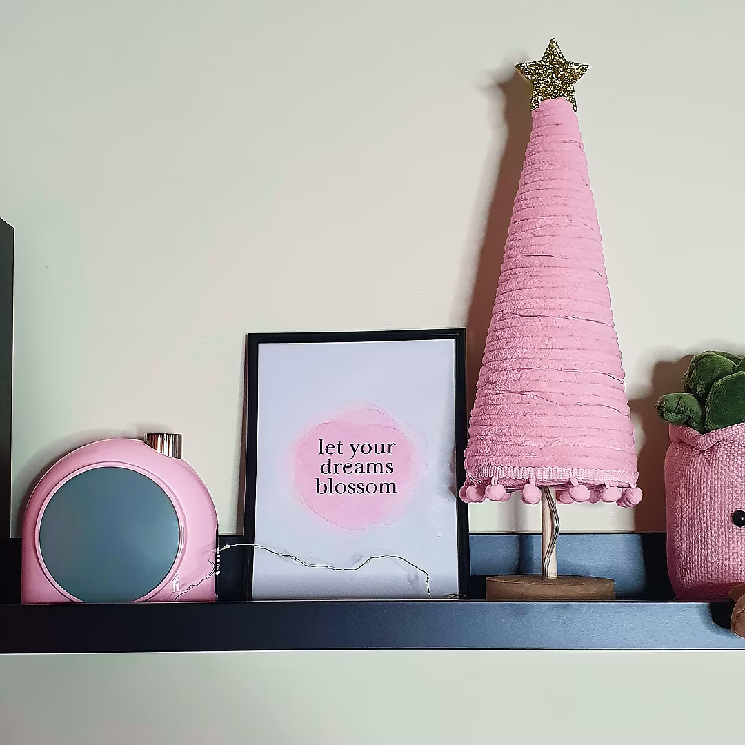 Aesthetic pink office decor - Divoom pink lamp for soft cozy lighting in a small space setup.