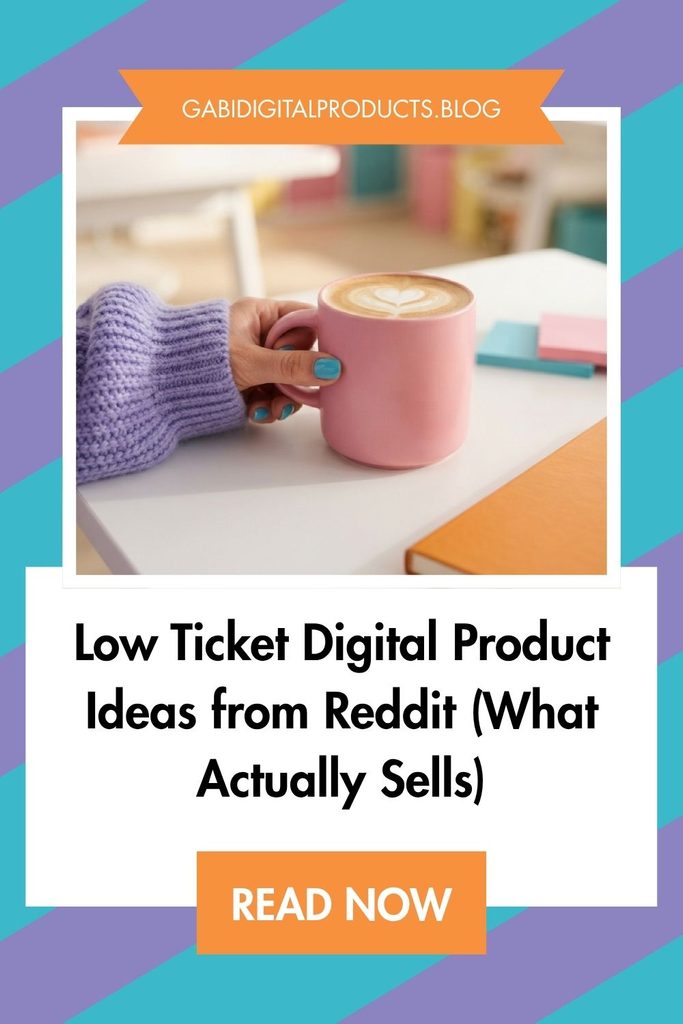 A promotional graphic for Gabi Digital Products Blog featuring a hand in a purple sweater holding a pink mug of coffee with latte art on a white table. Above the image, an orange banner displays the website URL "GABIDIGITALPRODUCTS.BLOG," and below it, a white text box features the bold title "Low Ticket Digital Product Ideas from Reddit (What Actually Sells)" above an orange "READ NOW" button, set against a diagonal purple and teal striped background.